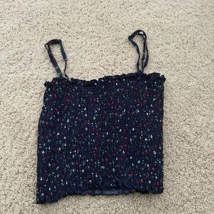 Navy blue Brandy tank top. One size but fits around a small.